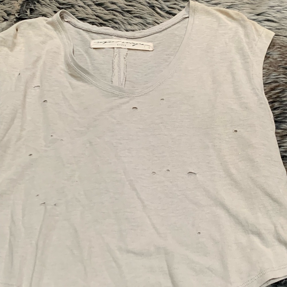 Raquel Allegra crop sleeveless, top with distressed holes Size 1
(Small)